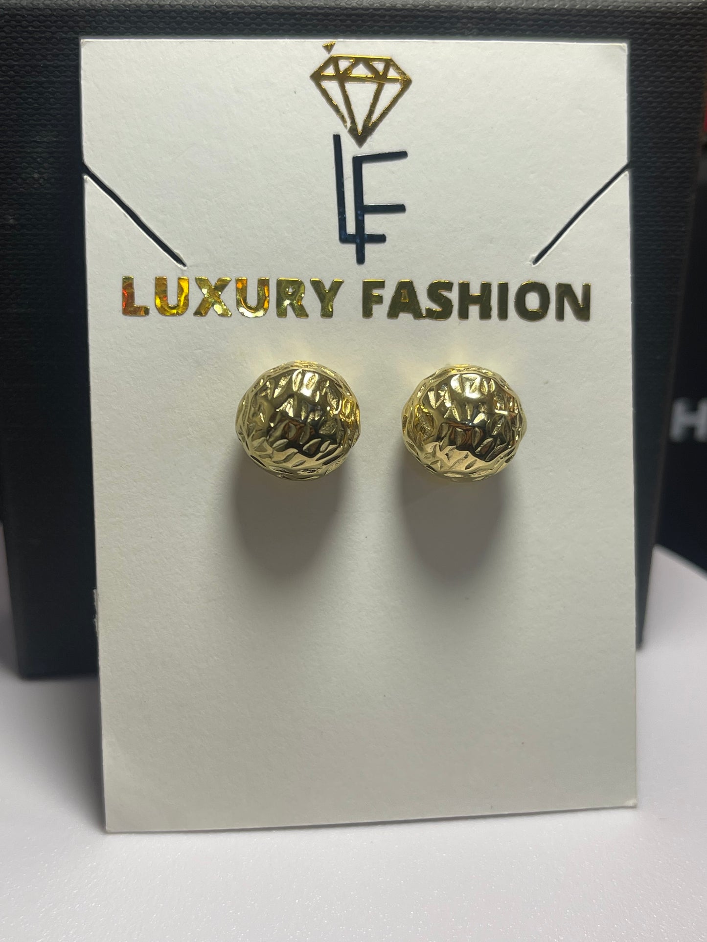 Aretes Luxury Fashion