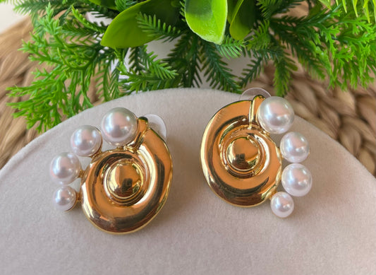 Aretes Luxury Fashion