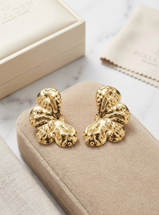 Aretes Luxury Fashion