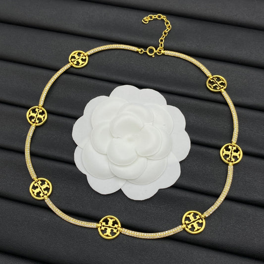 Collar Tory Burch