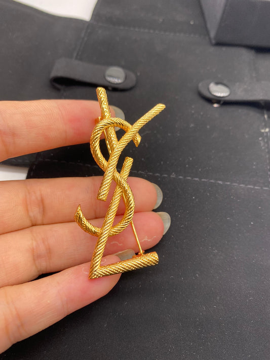 Broche Yves Saint Laurent