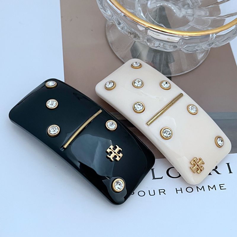 Ganchos Tory Burch