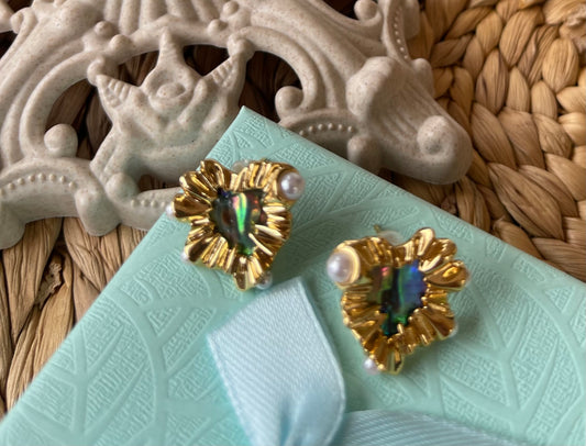 Aretes Luxury Fashion