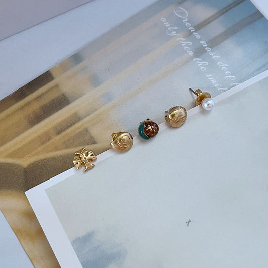 Aretes Tory Burch Varios