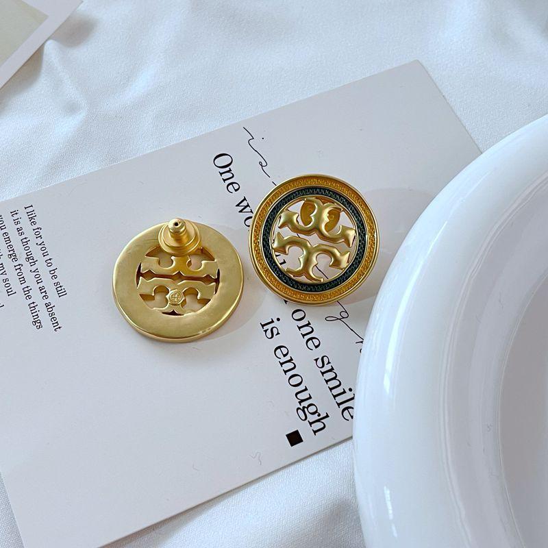 Aretes Tory Burch