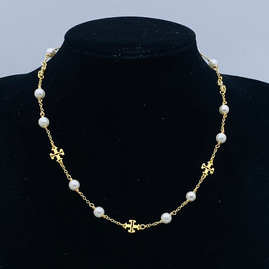 Collar Tory Burch