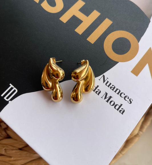 Aretes Luxury Fashion